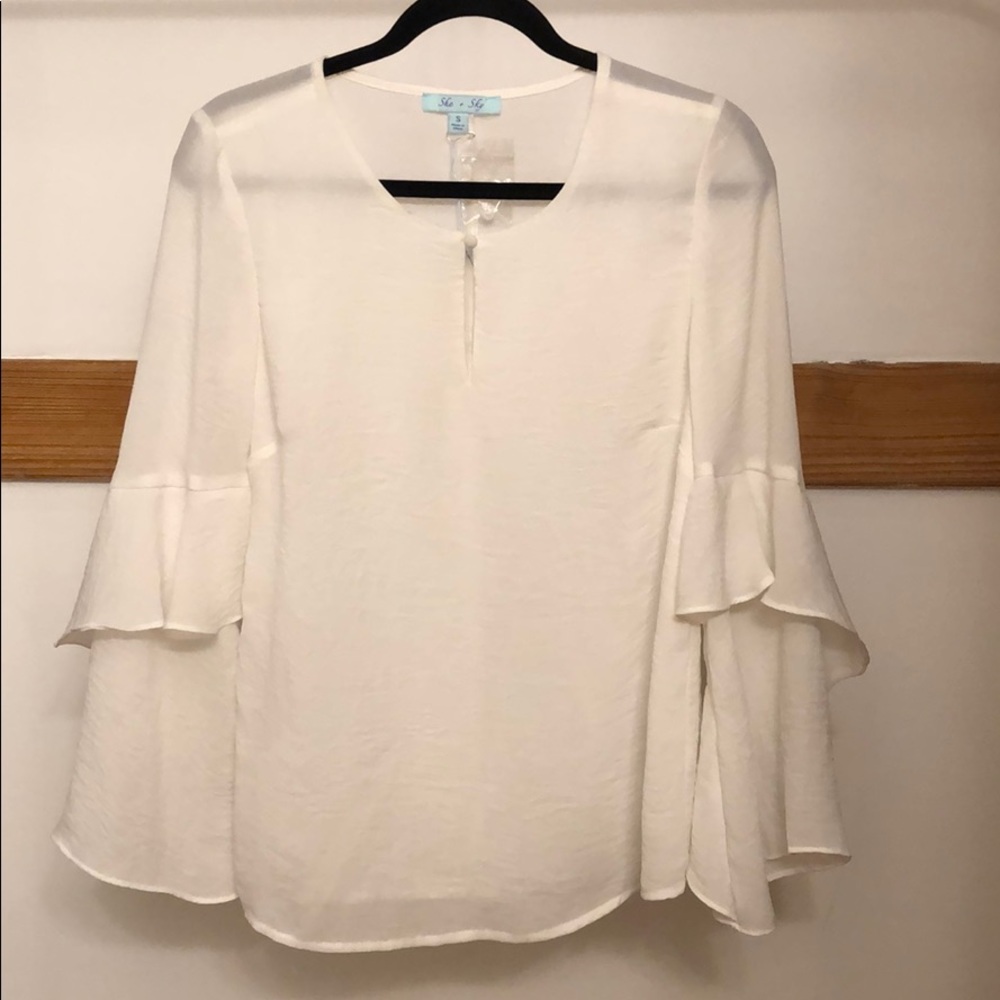 Women’s white bell sleeve blouse